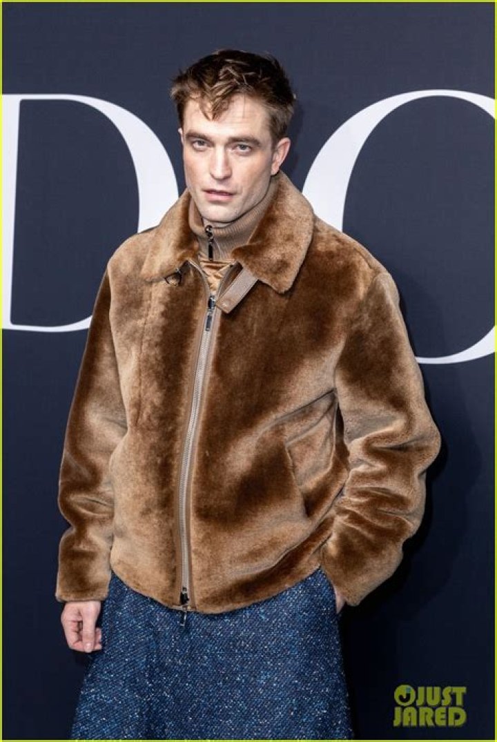 
At Dior Paris Fashion Week Show Robert Pattinson Looks Stylish in a Tweed Skirt 