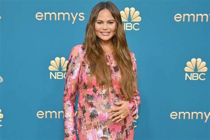 
Pregnant Chrissy Teigen Shows Off Bare Baby Bump in Cute PJ Set: ‘Dress for the Job You Want’ 